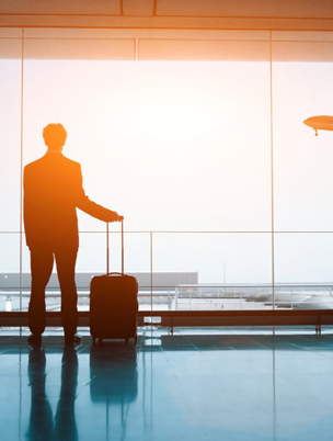 man waiting in airport