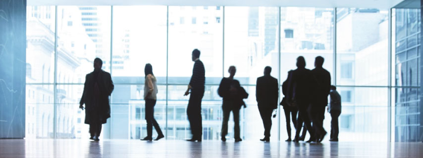 a group of people standing in a room