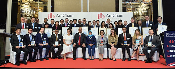 a group of people posing for a photo