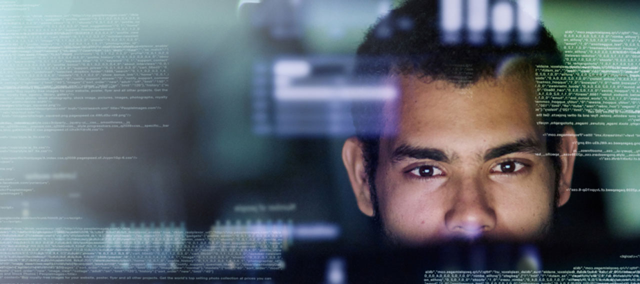 man reading computer code