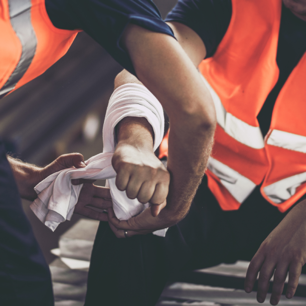 worker having bandage applied