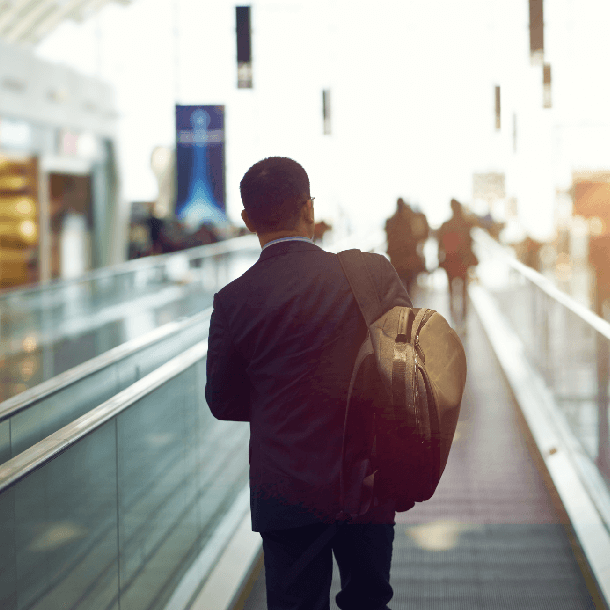 man on moving walkway