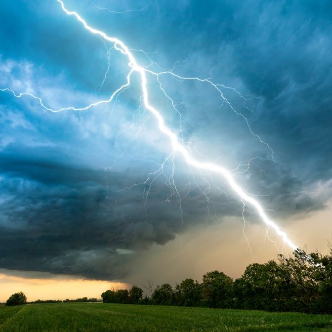 lightning striking across sky