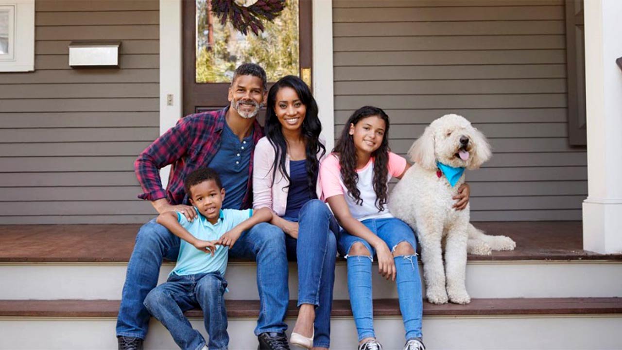 family with their dog