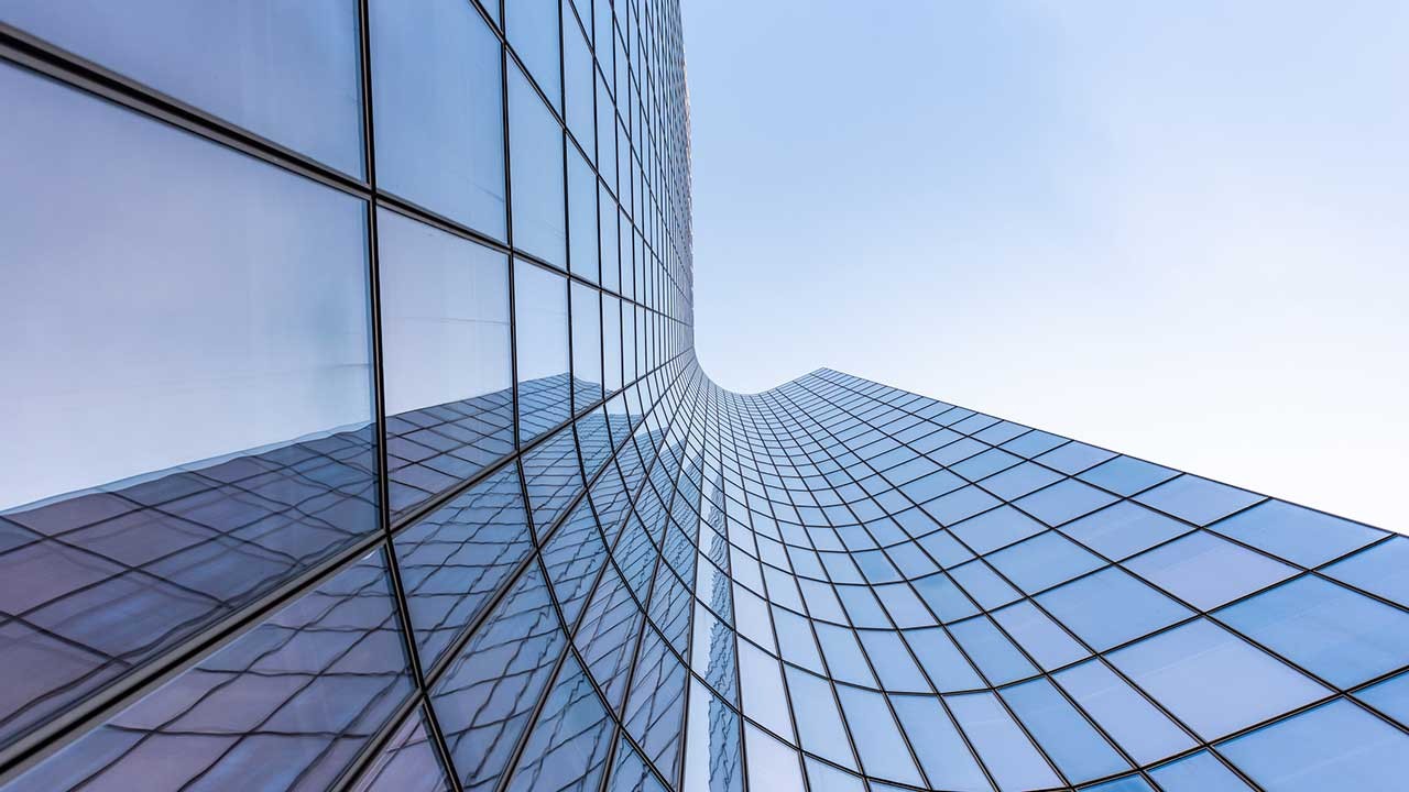 blue curved skyscraper