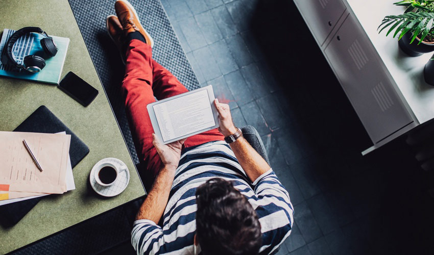 man holding tablet