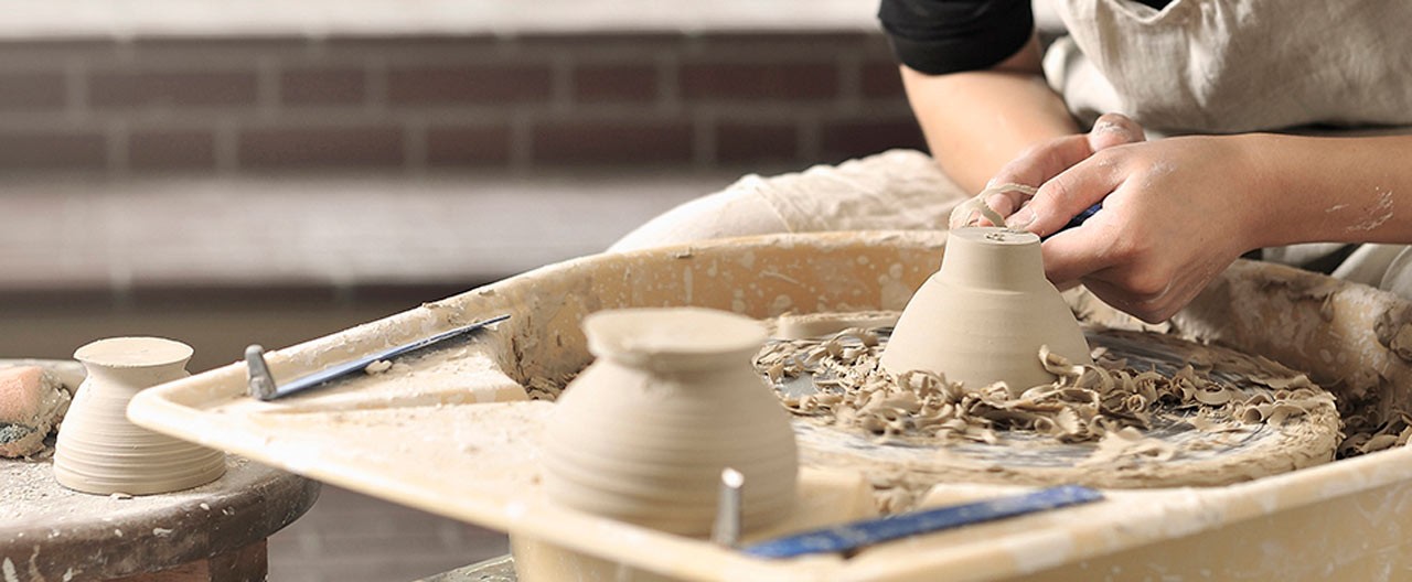 a person doing pottery