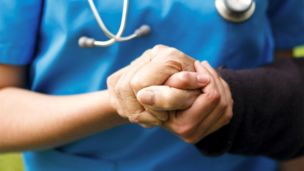 doctor comforts patient