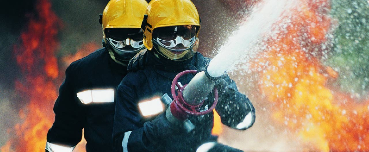 fire fighters putting out fire