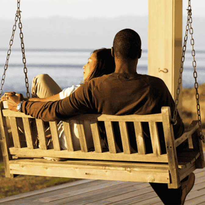couple on swing cuddling