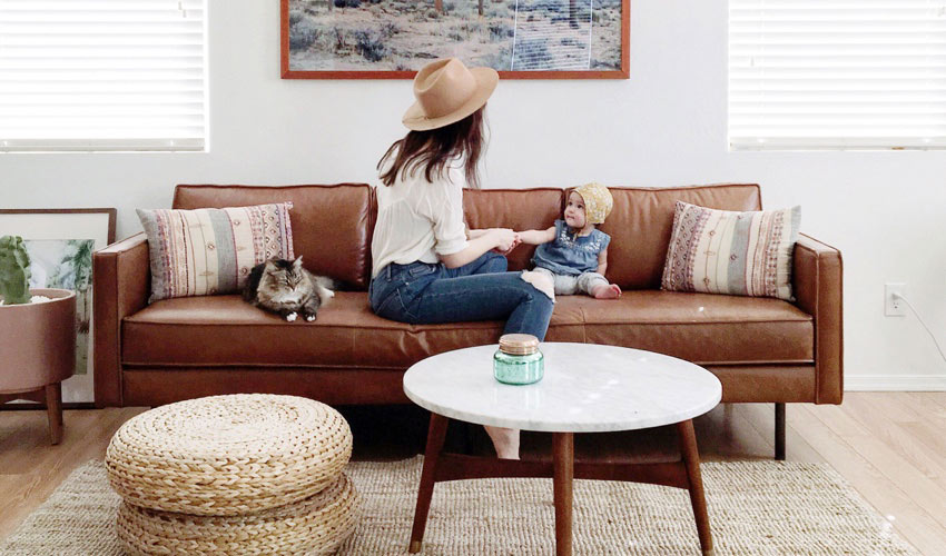 Mother and baby on couch