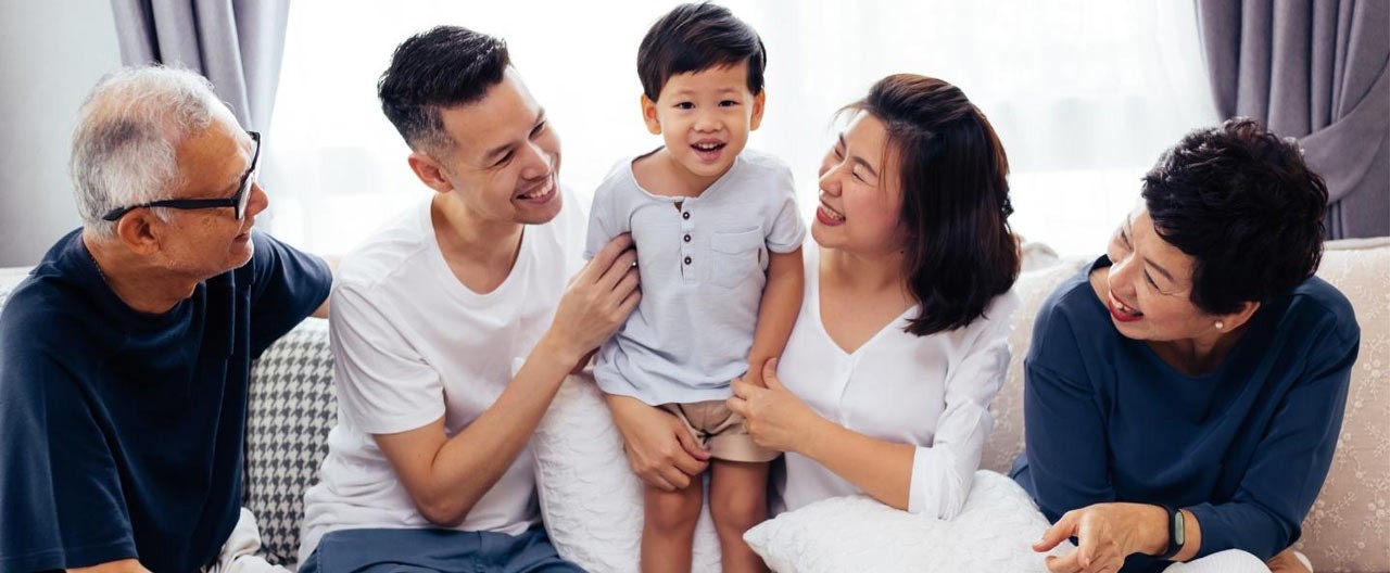 happy family sitting on the sofa