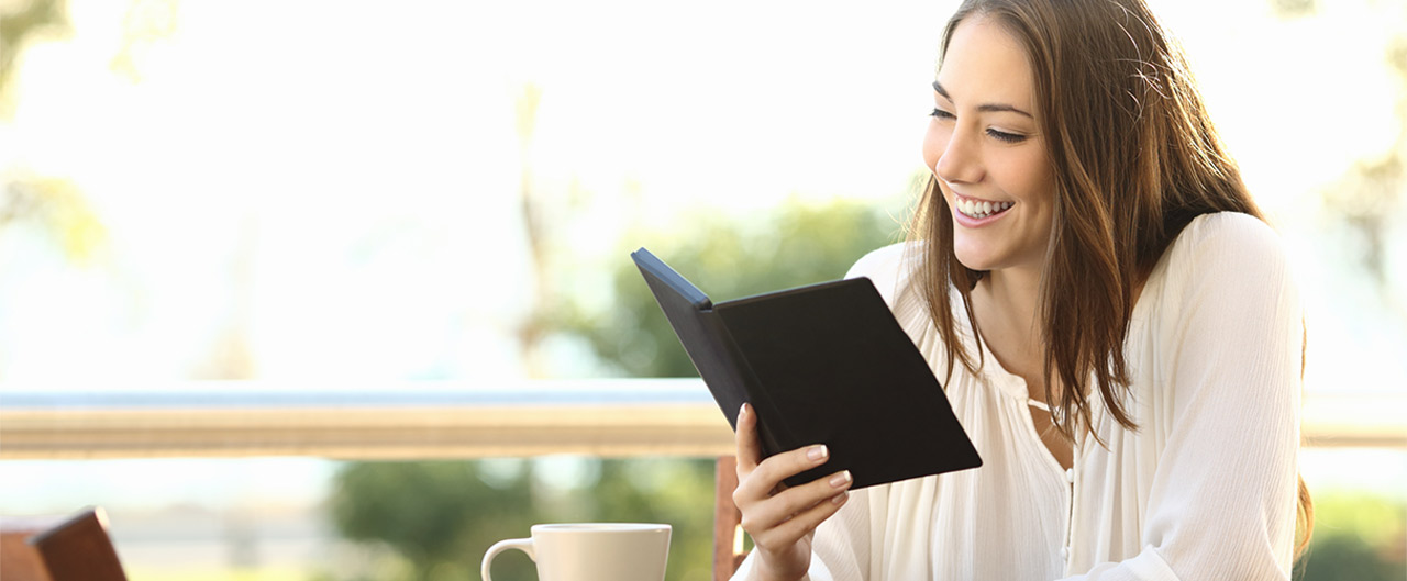woman reading blog