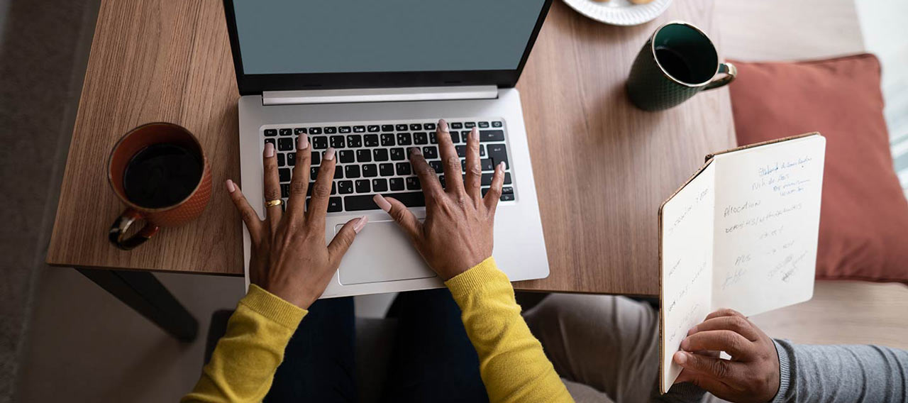 couple working with laptop