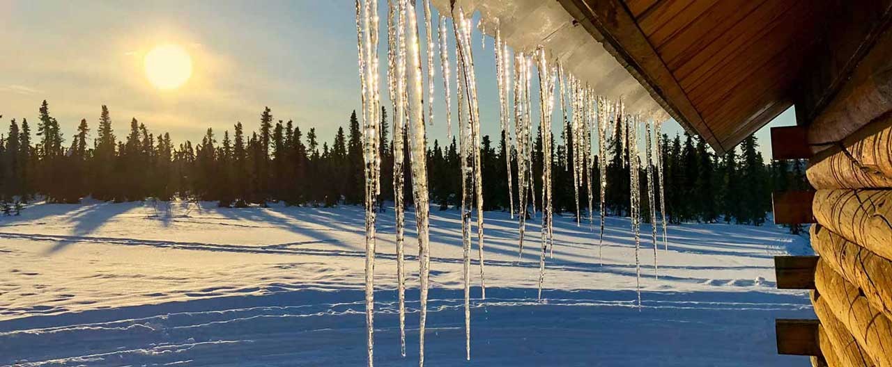 frozen roof with a snow view