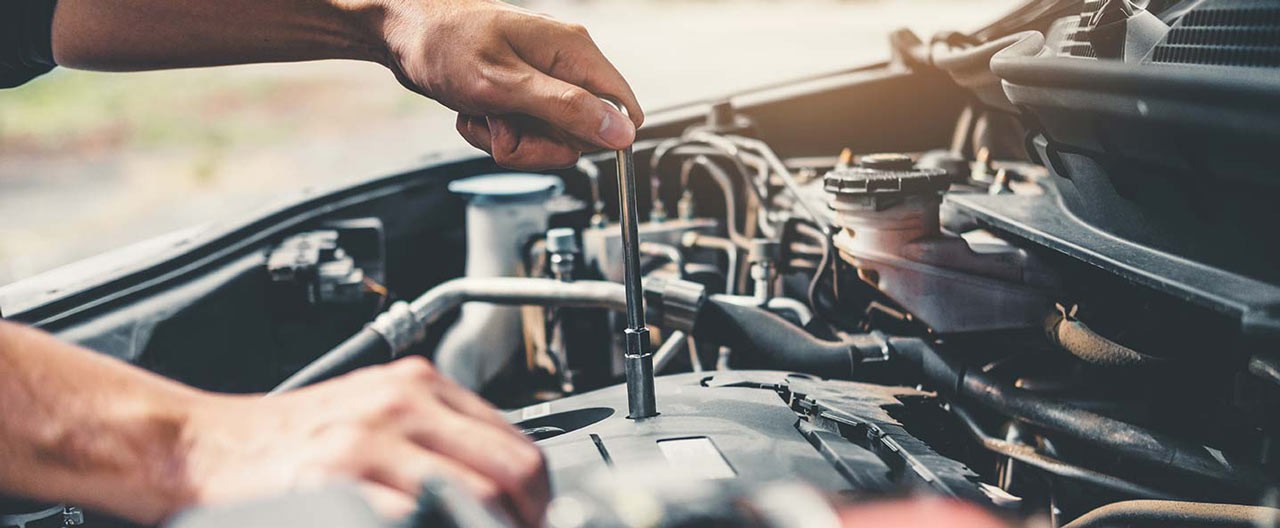 mechanic fixing car