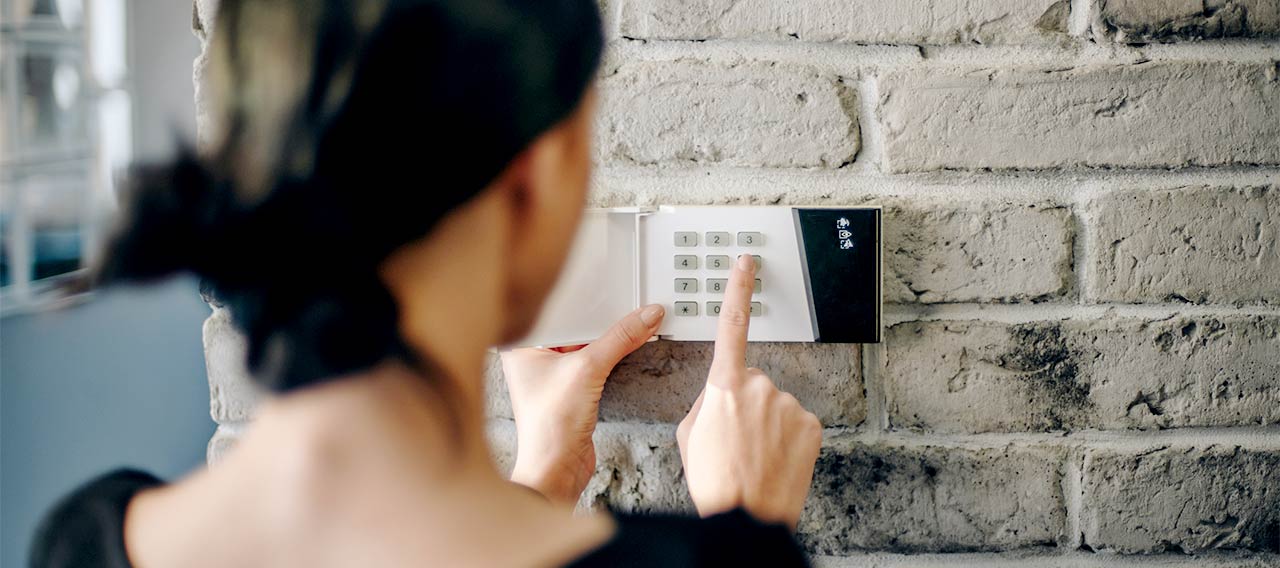 woman entering security code