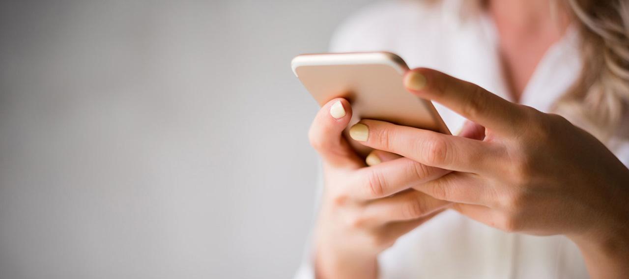 woman holding a phone