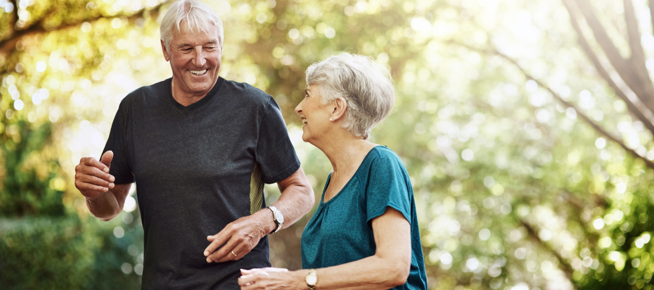 elderly couple laughing