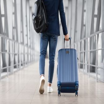 traveler and suitcase